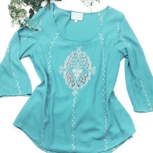 Skies are blue  embroidered half sleeve top.
Size xsmall